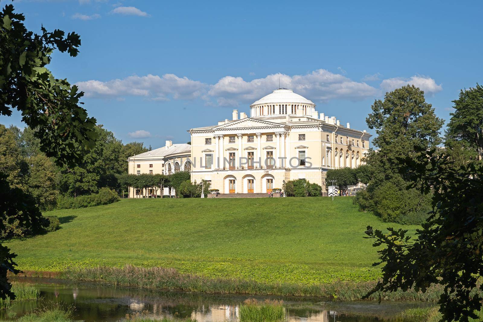 Pavlovsk, St. Petersburg, Russia - September 20, 2002. View of the Pavlovsk Palace on the banks of the Slavyanka River in the Pavlovsk State Museum-Reserve. Selective focus...