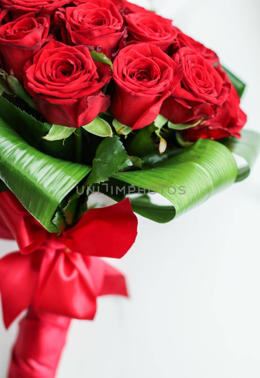 Holiday love present on Valentines Day, luxury bouquet of red roses by Anneleven