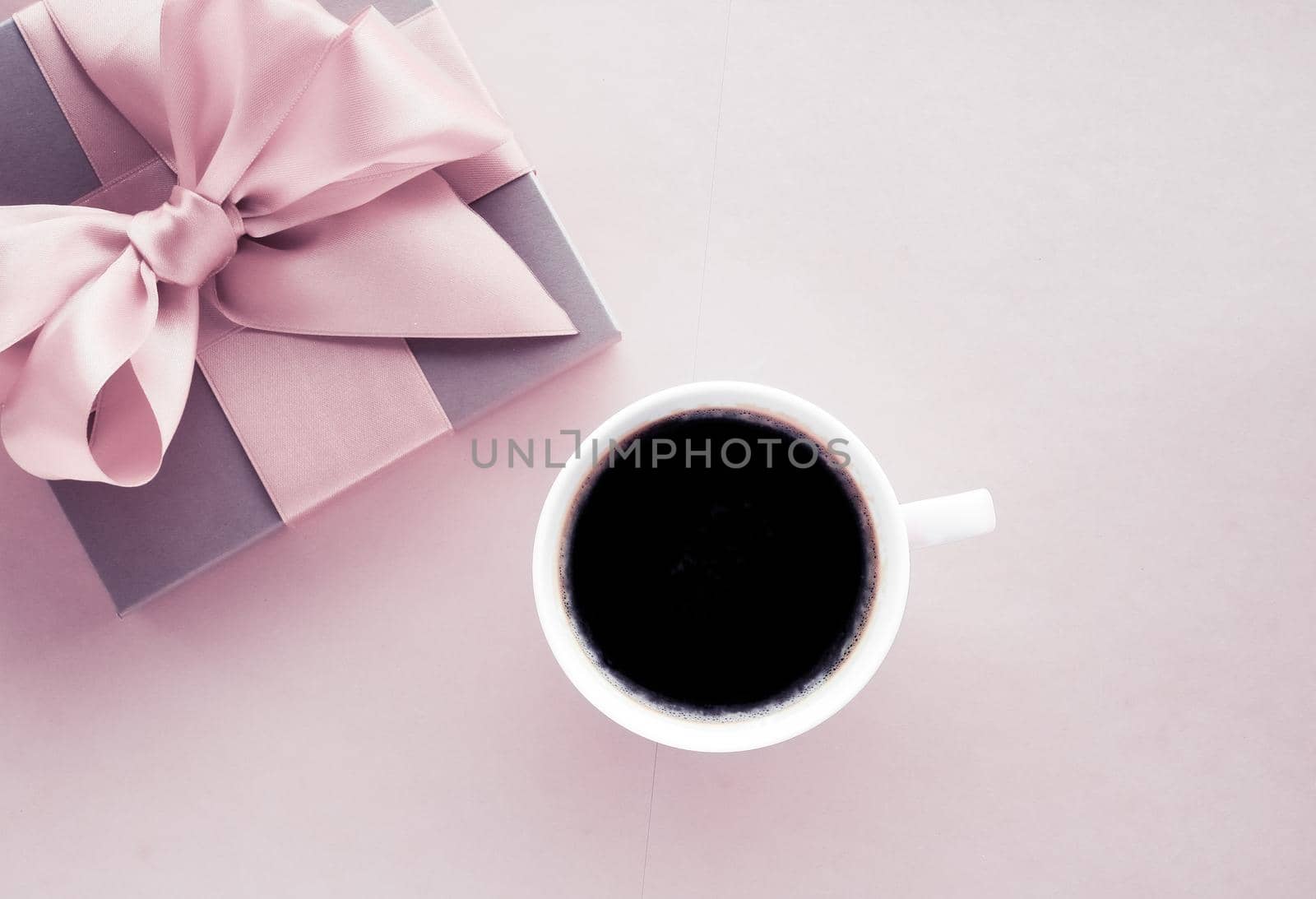 Luxury gift box and coffee cup on blush pink background, flatlay design for romantic holiday and birthday surprise by Anneleven