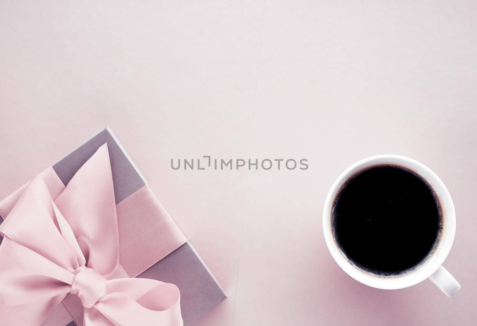 French chic, Valentines Day present and beauty drink concept - Luxury gift box and coffee cup on blush pink background, flatlay design for romantic holiday and birthday surprise