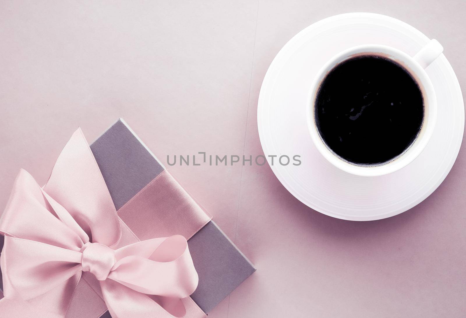 French chic, Valentines Day present and beauty drink concept - Luxury gift box and coffee cup on blush pink background, flatlay design for romantic holiday and birthday surprise