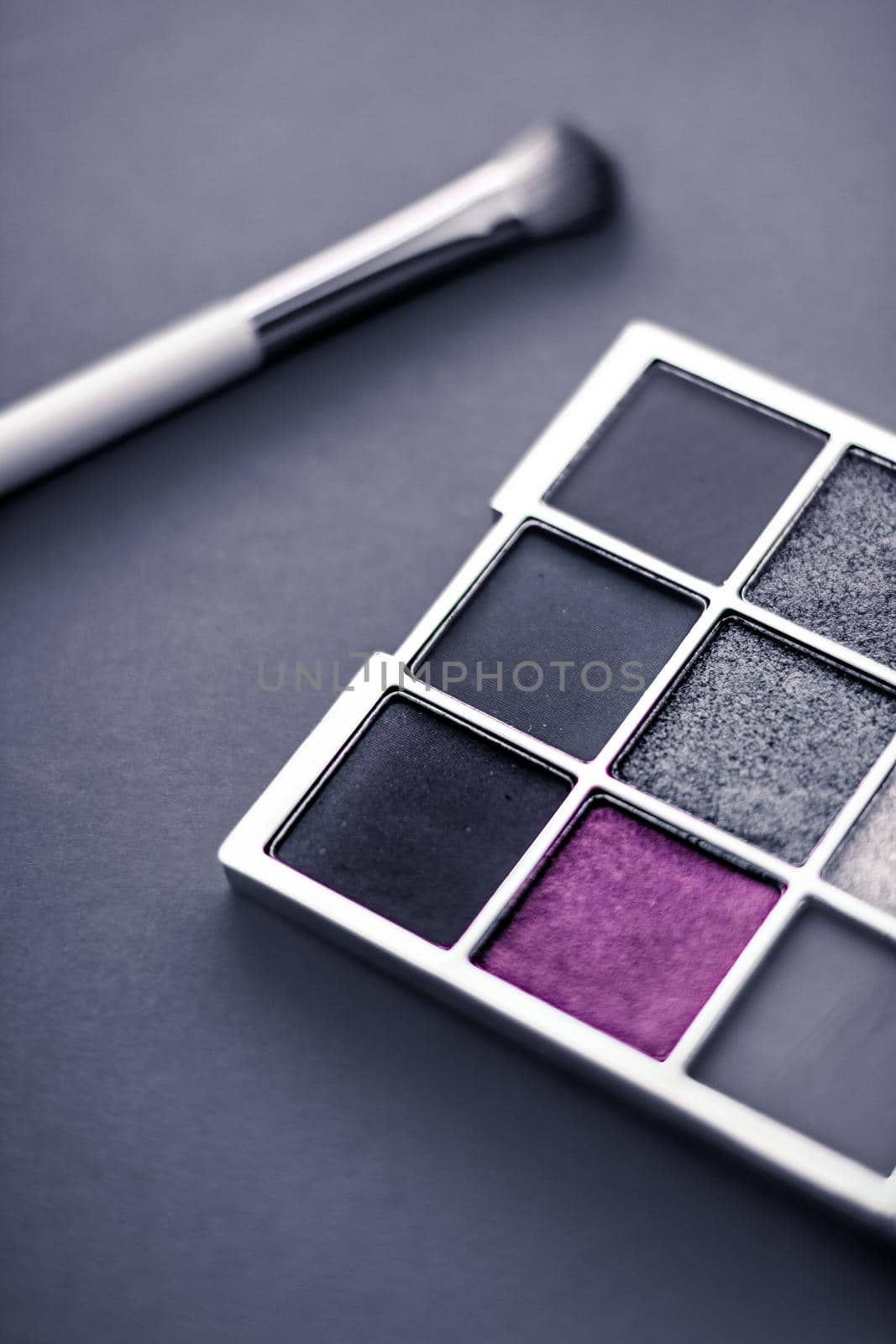 Eyeshadow palette and make-up brush on graphite background, eye shadows cosmetics product for luxury beauty brand promotion and holiday fashion blog design by Anneleven