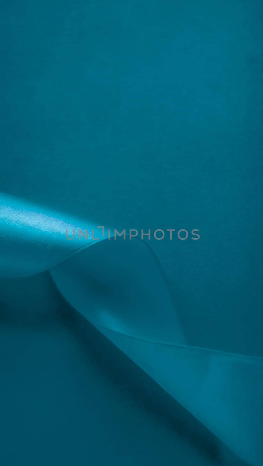 Branding, holidays and luxe brands concept - Abstract silk ribbon on aqua blue background, exclusive luxury brand design for holiday sale product promotion and glamour art invitation card backdrop