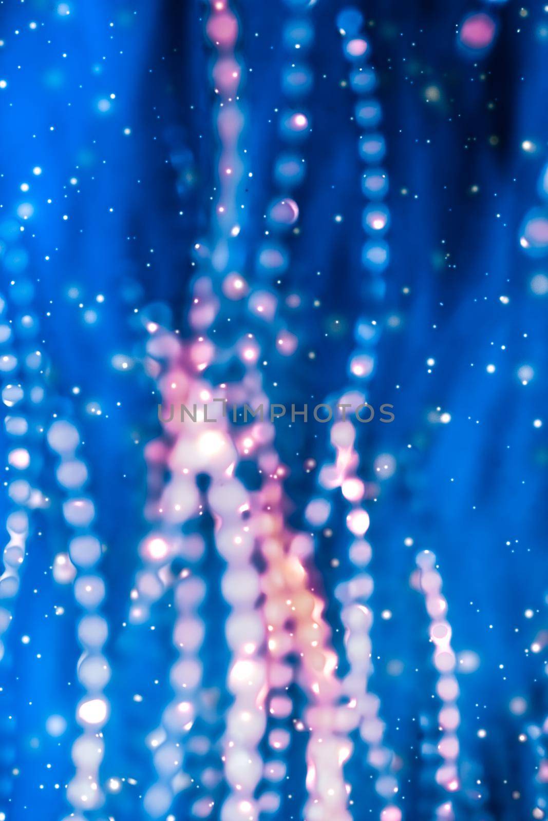 Christmas lights, New Years Eve fireworks and abstract texture concept - Magic sparkling shiny glitter and glowing snow, luxury winter holiday background