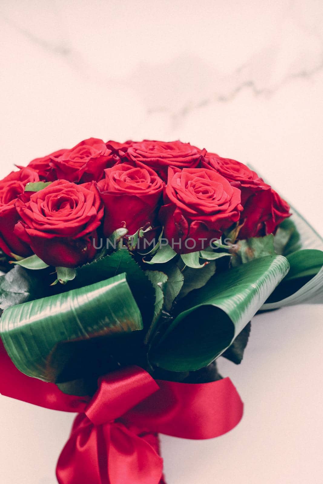 Luxury bouquet of red roses on marble background, beautiful flowers as holiday love present on Valentines Day by Anneleven