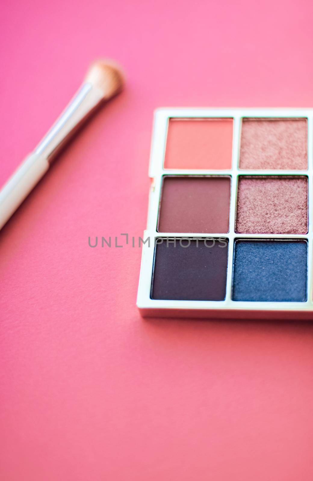 Eyeshadow palette and make-up brush on coral background, eye shadows cosmetics product for luxury beauty brand promotion and holiday fashion blog design by Anneleven