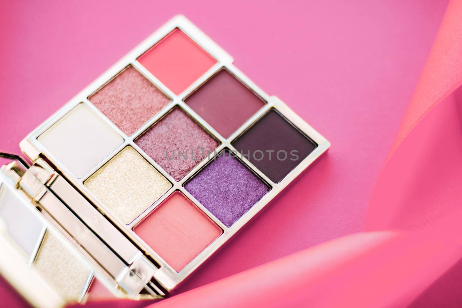 Eyeshadow palette and make-up brush on rose background, eye shadows cosmetics product for luxury beauty brand promotion and holiday fashion blog design by Anneleven