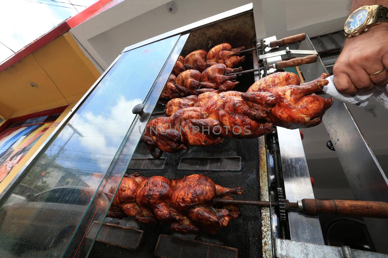 salvador, bahia, brazil - september 17, 2022: Roast chicken at a street restaurant in Salvador city.
