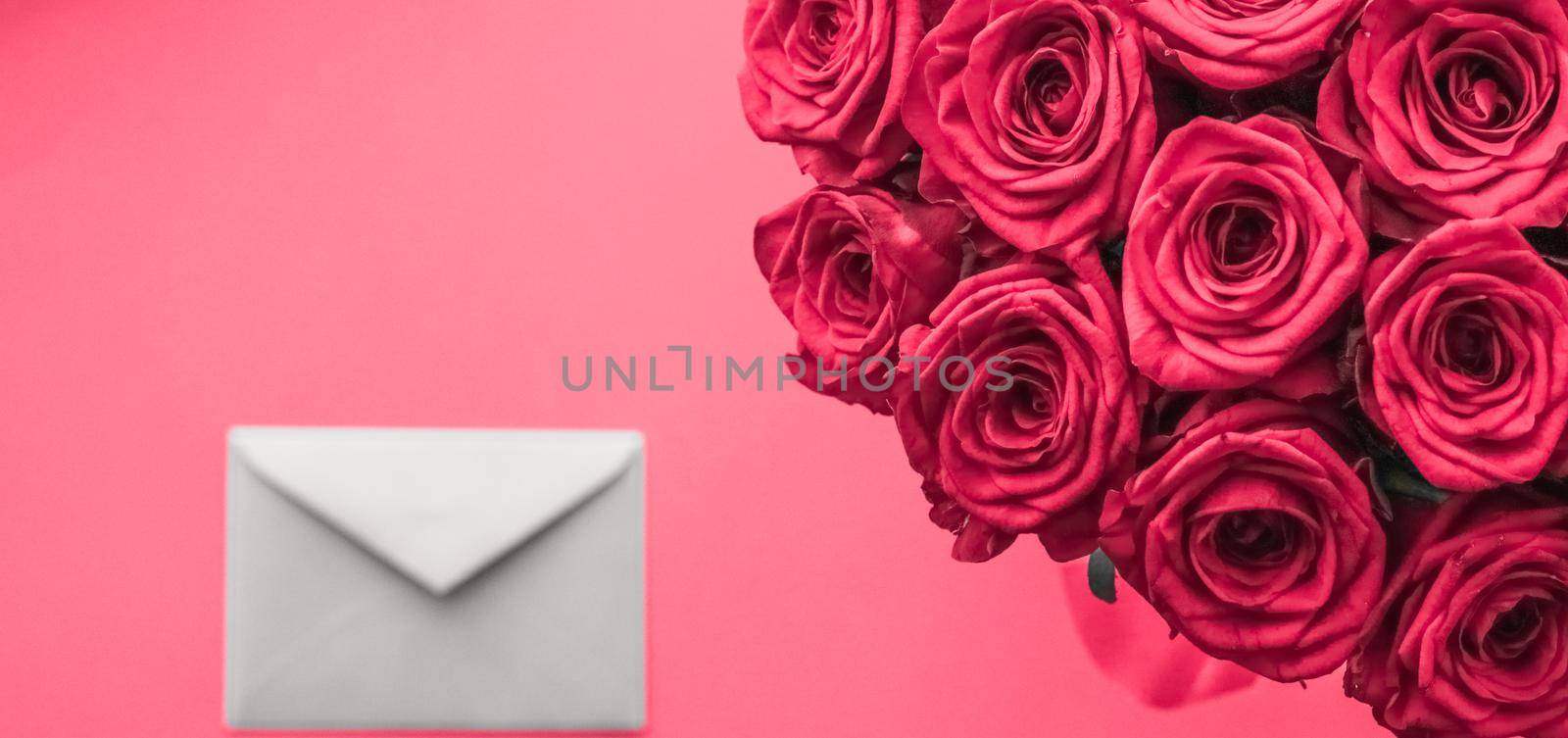 Holidays gift, floral present and happy relationship concept - Love letter and flowers delivery on Valentines Day, luxury bouquet of roses and card on pink background for romantic holiday design