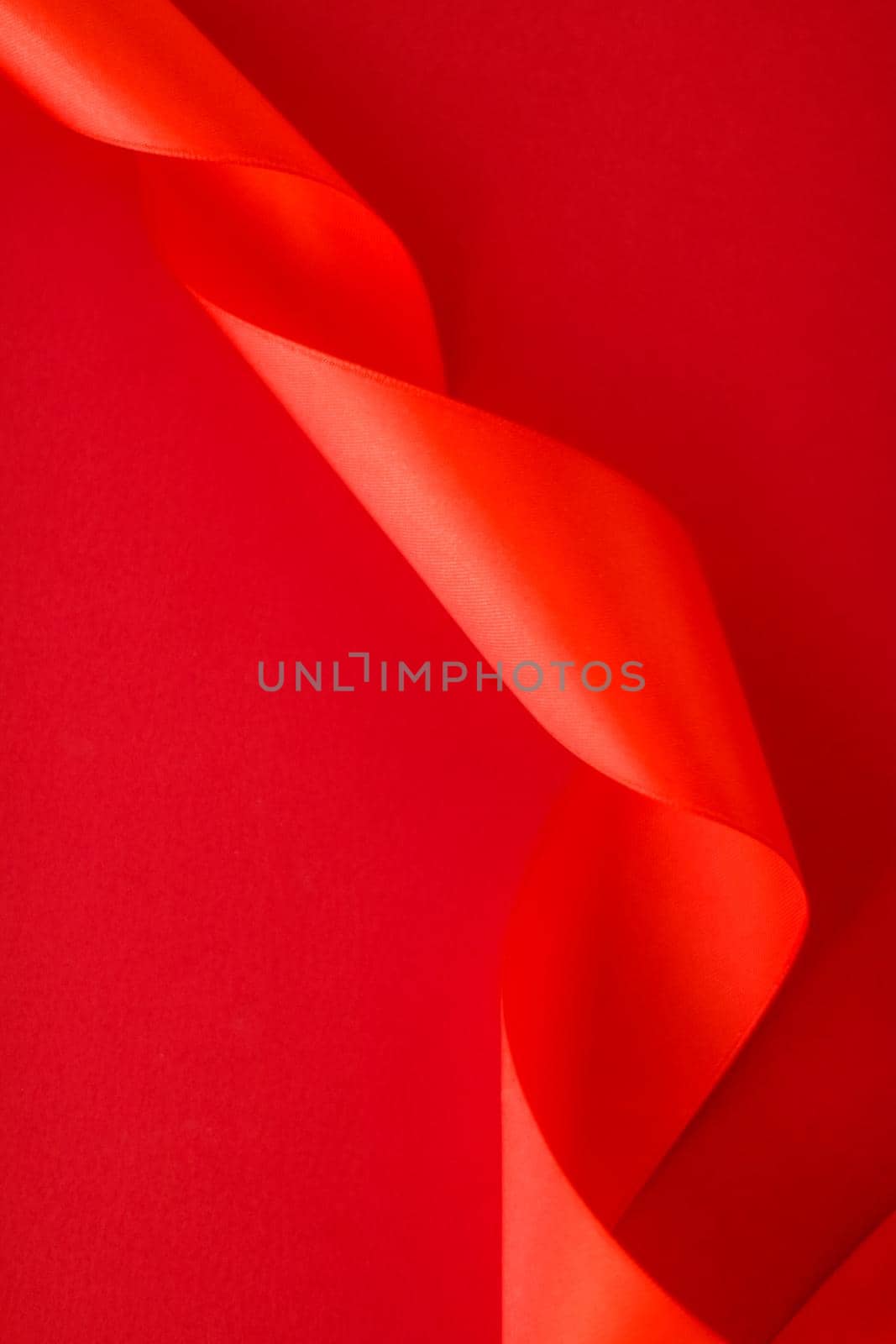 Abstract curly silk ribbon on red background, exclusive luxury brand design for holiday sale product promotion and glamour art invitation card backdrop by Anneleven