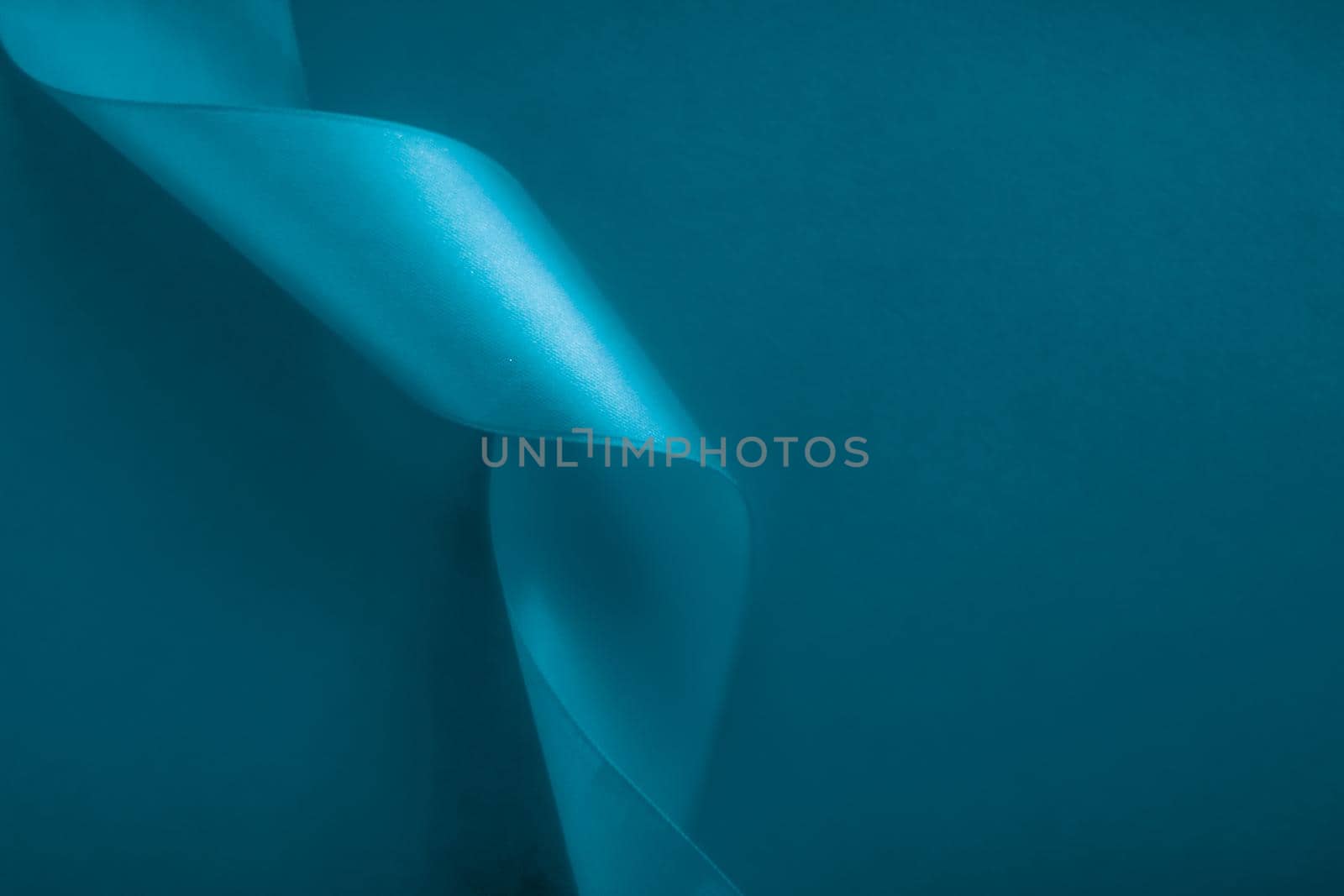 Branding, holidays and luxe brands concept - Abstract silk ribbon on aqua blue background, exclusive luxury brand design for holiday sale product promotion and glamour art invitation card backdrop