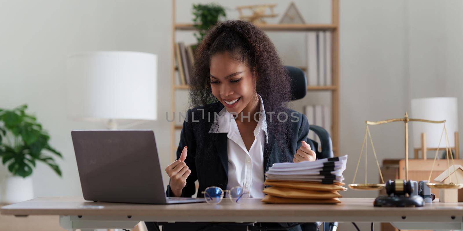 Lawyer business woman do winner gesture. lawyers won the case concept.