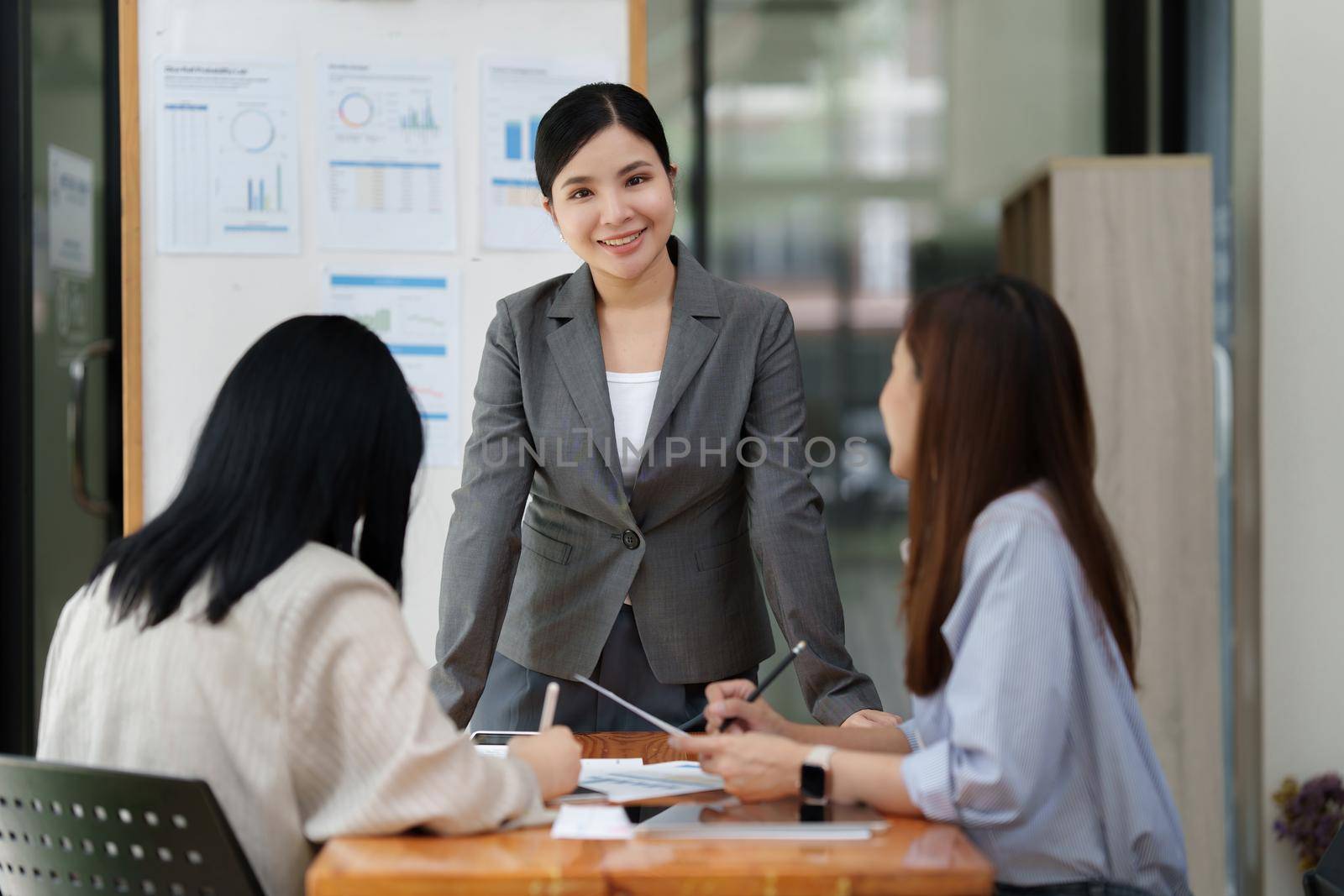 Financial Analyst discussing with Investment Banker at Meeting Room. Fund investment concept.