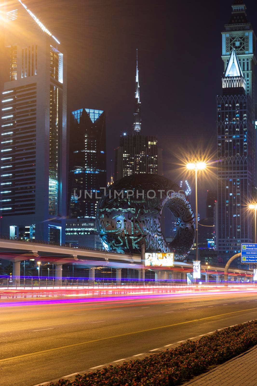 Dubai,UAE - 05.18.2021 Main road of a United Arab Emirates, Shekh Zayed road.Many of famous buildings can be seen as well as metro station and Museum of future.