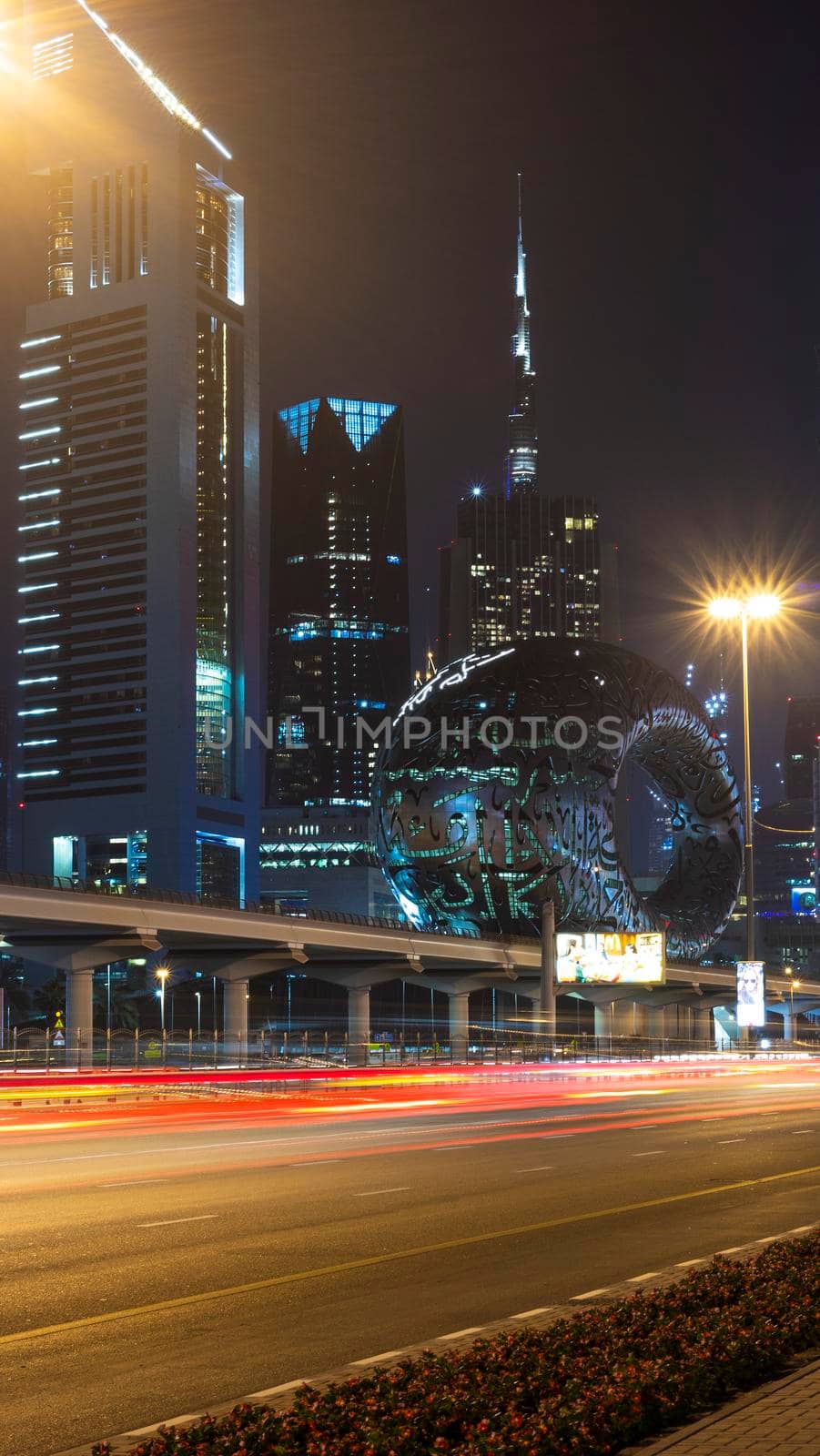 Dubai,UAE - 05.18.2021 Main road of a United Arab Emirates, Shekh Zayed road.Many of famous buildings can be seen as well as metro station and Museum of future.