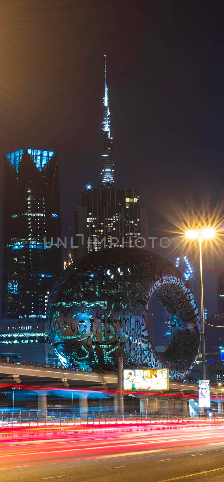 Dubai,UAE - 05.18.2021 Main road of a United Arab Emirates, Shekh Zayed road.Many of famous buildings can be seen as well as metro station and Museum of future.