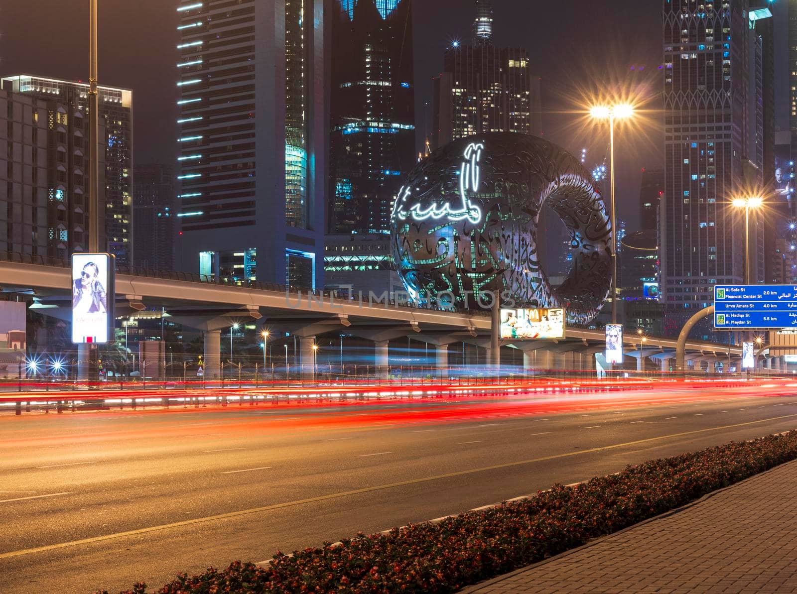 Dubai,UAE - 05.18.2021 Main road of a United Arab Emirates, Shekh Zayed road.Many of famous buildings can be seen as well as metro station and Museum of future