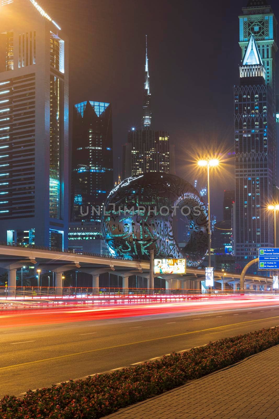 Dubai,UAE - 05.18.2021 Main road of a United Arab Emirates, Shekh Zayed road.Many of famous buildings can be seen as well as metro station and Museum of future.