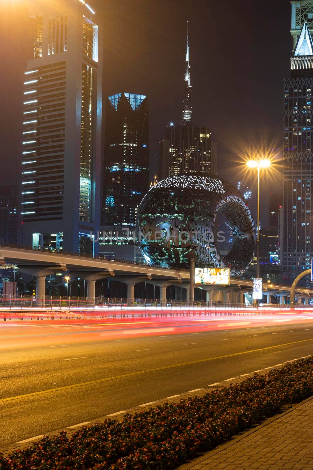 Dubai,UAE - 05.18.2021 Main road of a United Arab Emirates, Shekh Zayed road.Many of famous buildings can be seen as well as metro station and Museum of future.