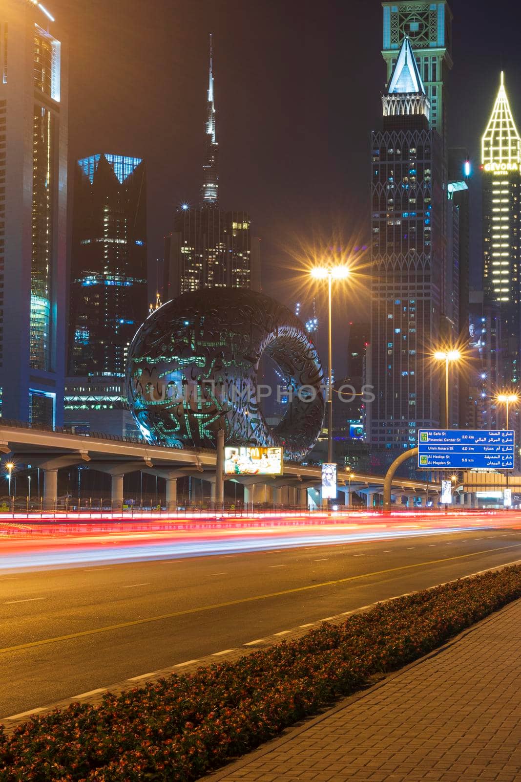 Dubai,UAE - 05.18.2021 Main road of a United Arab Emirates, Shekh Zayed road.Many of famous buildings can be seen as well as metro station and Museum of future.