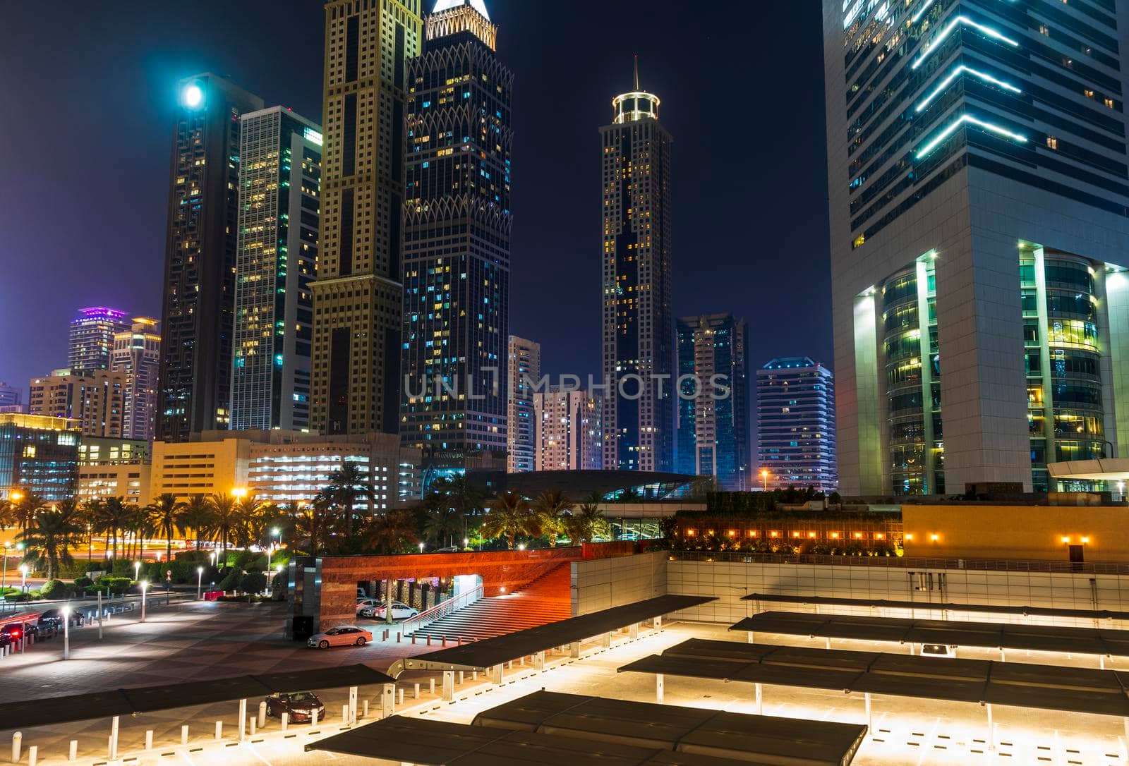 Dubai, UAE - 05.28.2021 Shot of a Dubai International Financial center and Sheikh Zayed road at night.