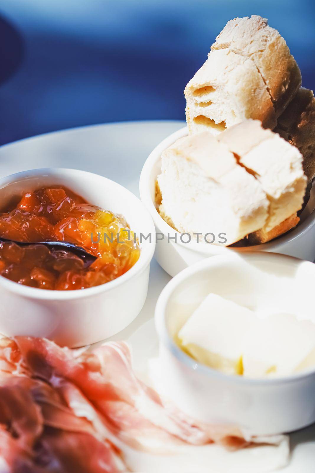 Breakfast outdoors in summer, ham, jam, butter and ham by Anneleven