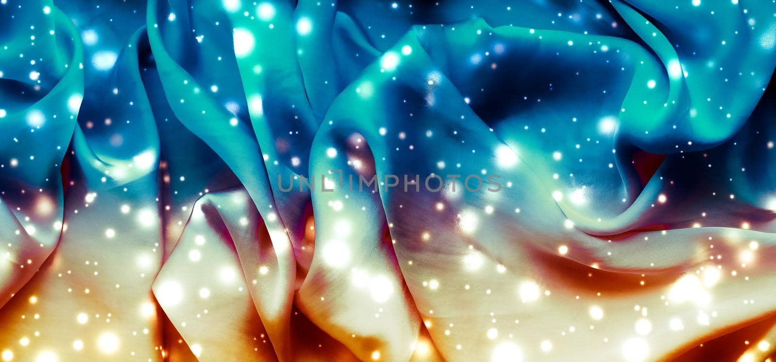 Winter fashion, shiny fabric and glamour style concept - Magic holiday blue and gold soft silk flatlay background texture with glowing snow, luxury beauty abstract backdrop