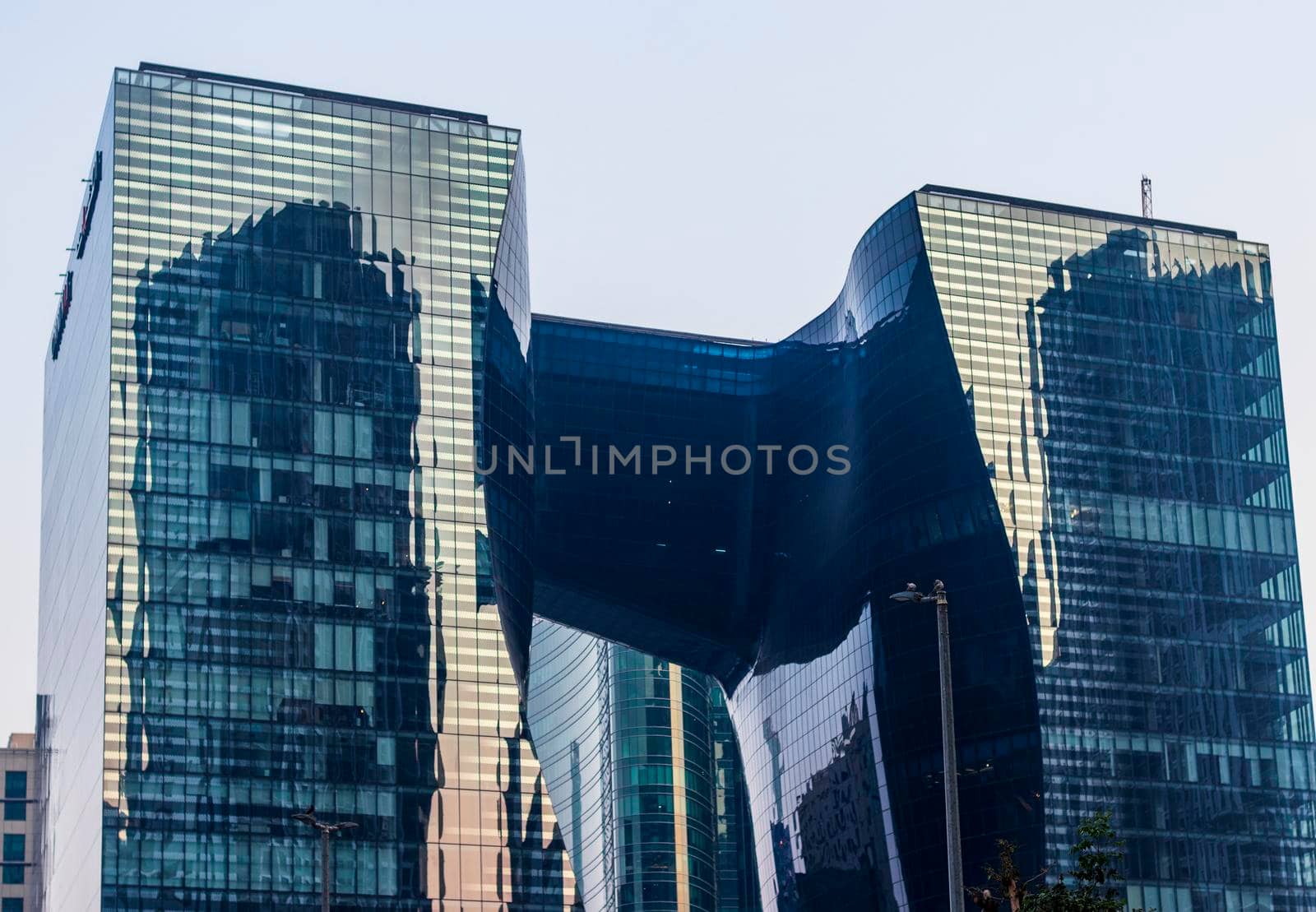 Dubai, UAE - 08.04.2021 - View of a Opus tower in Business bay district of Dubai