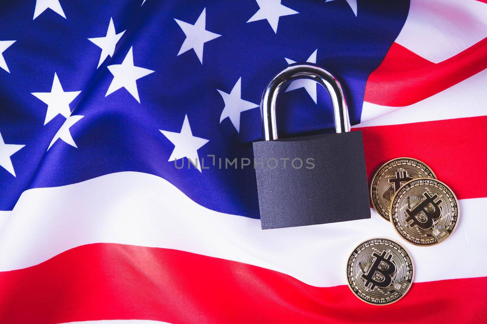 Bitcoins in the USA. Cryptocurrency ban in America.Usa flag and bitcoin coin. by Verrone