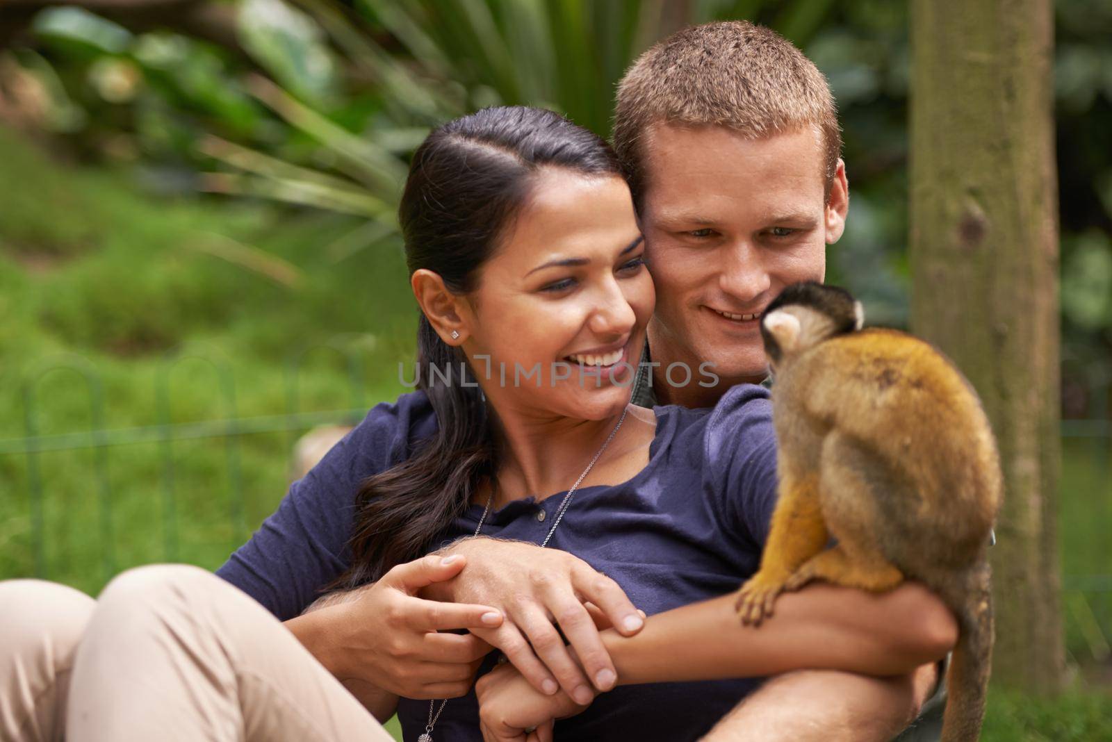 Hey look, its your mini-me. a young couple spending time at an animal sanctuary