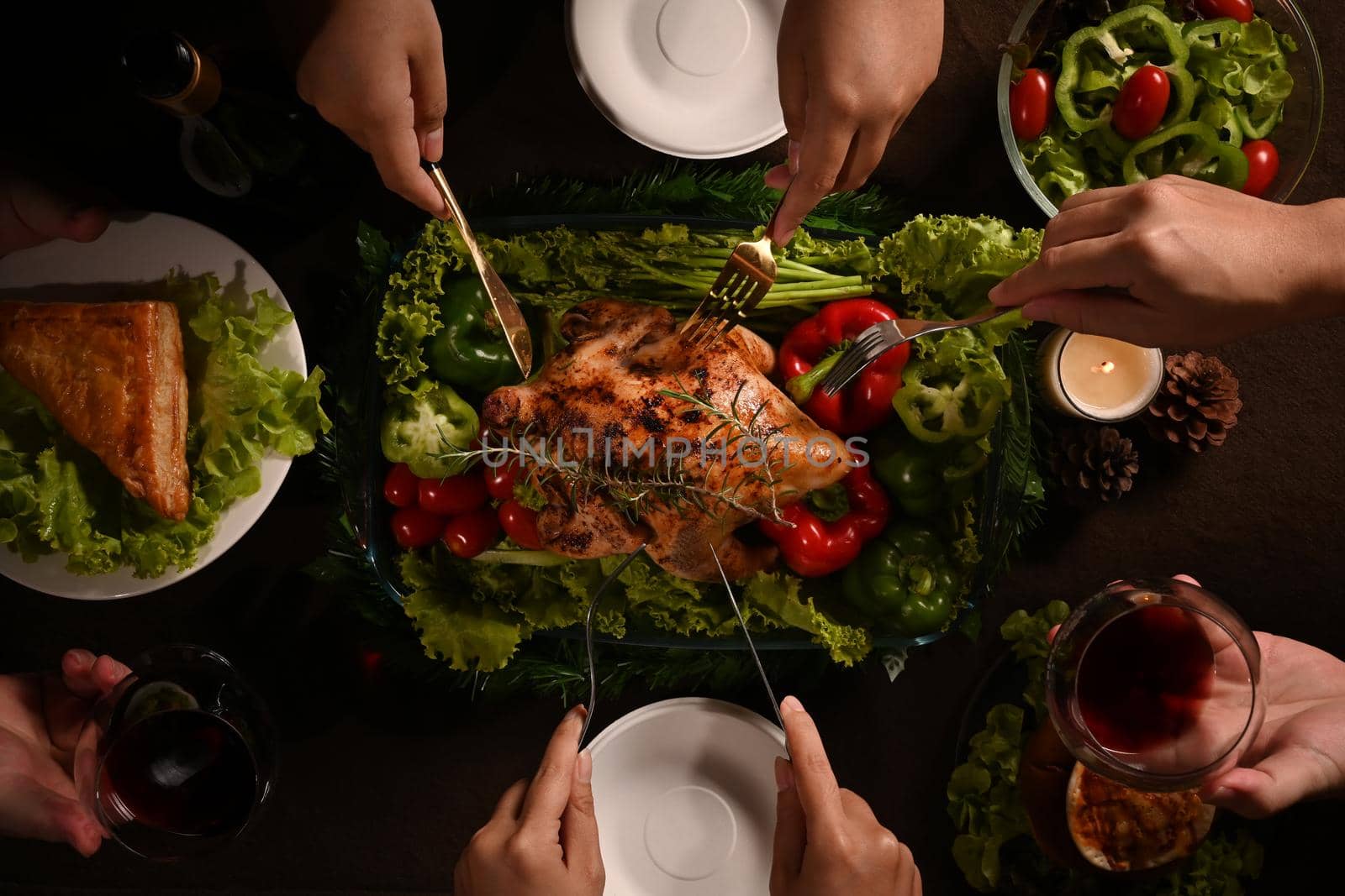 Traditional Thanksgiving dinner meal with roasted turkey and all sides dishes on wooden table. Traditional autumn food concept.