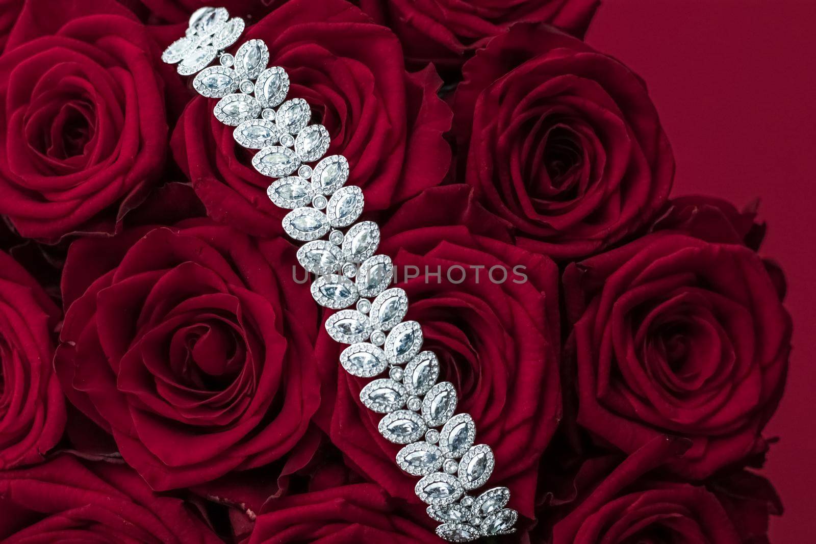 Luxury diamond jewelry bracelet and red roses flowers, love gift on Valentines Day and jewellery brand holiday background design by Anneleven