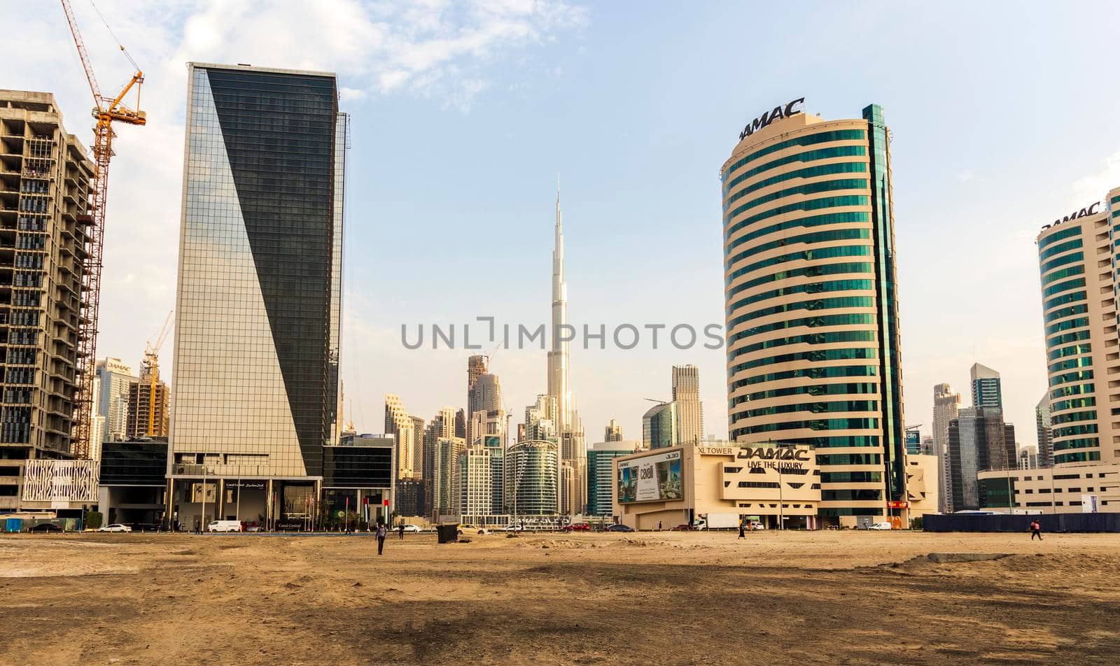 Dubai, UAE - 01.19.2021 - Burj Khalifa, tallest building in the world surrounded by other modern buildings