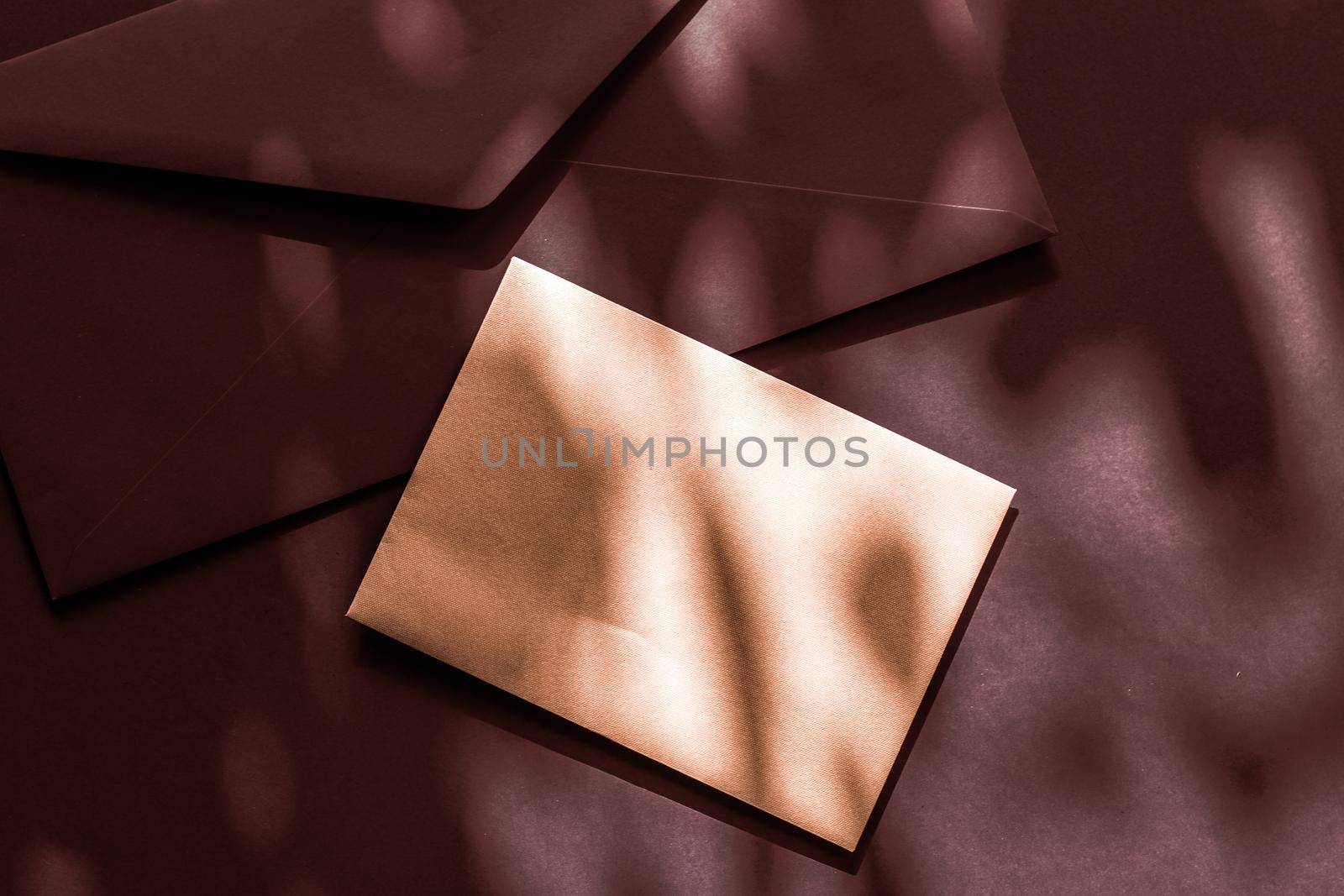 Holiday marketing, business kit and email newsletter concept - Beauty brand identity as flatlay mockup design, business card and letter for online luxury branding on chocolate shadow background