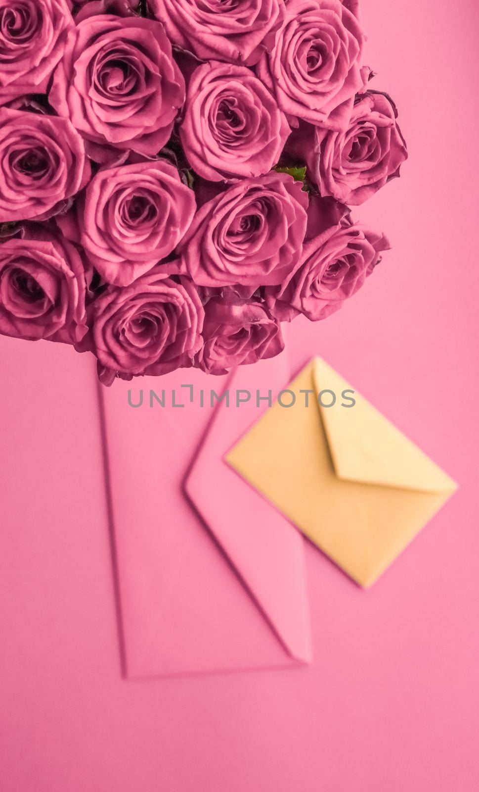 Holiday love letter and flowers delivery, luxury bouquet of roses and card on blush pink background for romantic holiday design by Anneleven