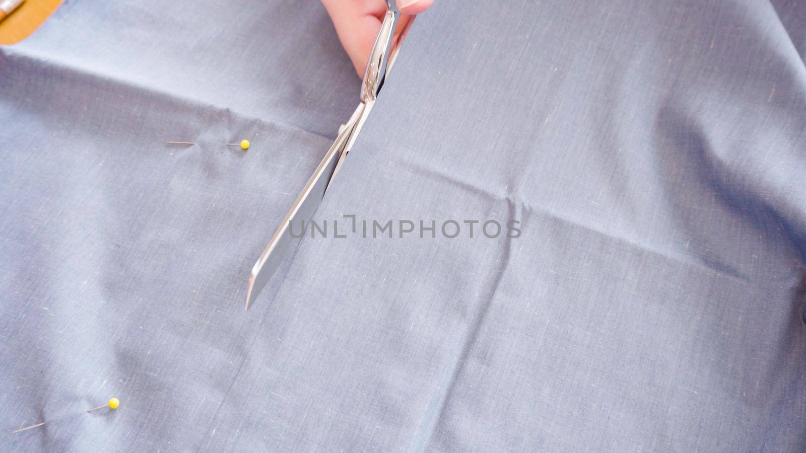 Sewing cotton face mask with a sewing machine for coronavirus outbreak.