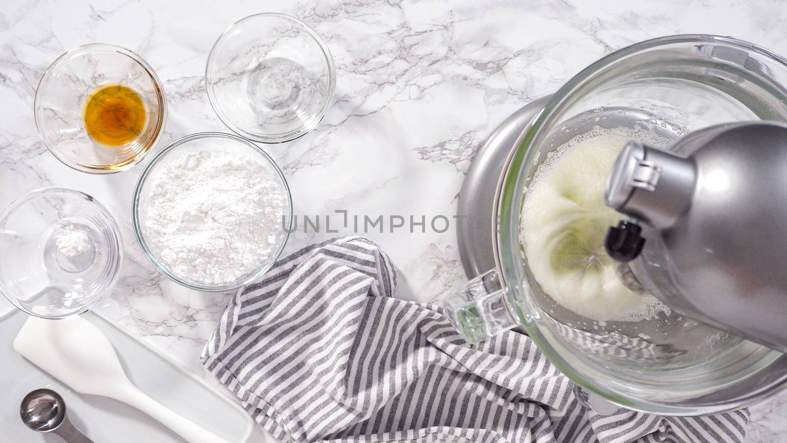 Step by step. Flat lay. Making meringue in kitchen mixer to bake unicorn meringue cookies.