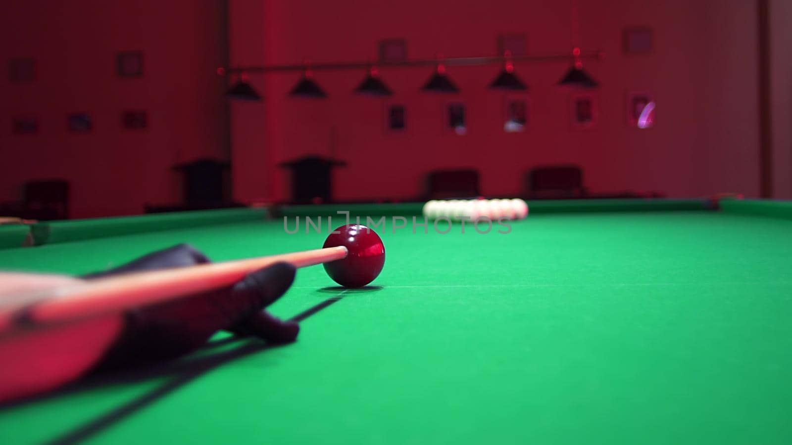 Man Playing Russian Billiards. First Blow Hit red ball Breaking the Ball Pyramid. 4K colorcorrected footage