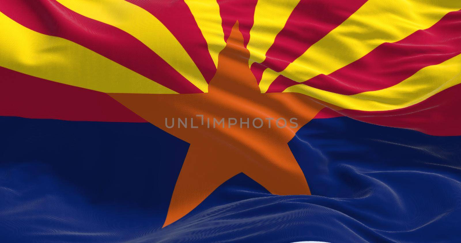 Close-up view of the Arizona state flag waving in the wind. Arizona is a state in the Western United States. Fabric textured background.
