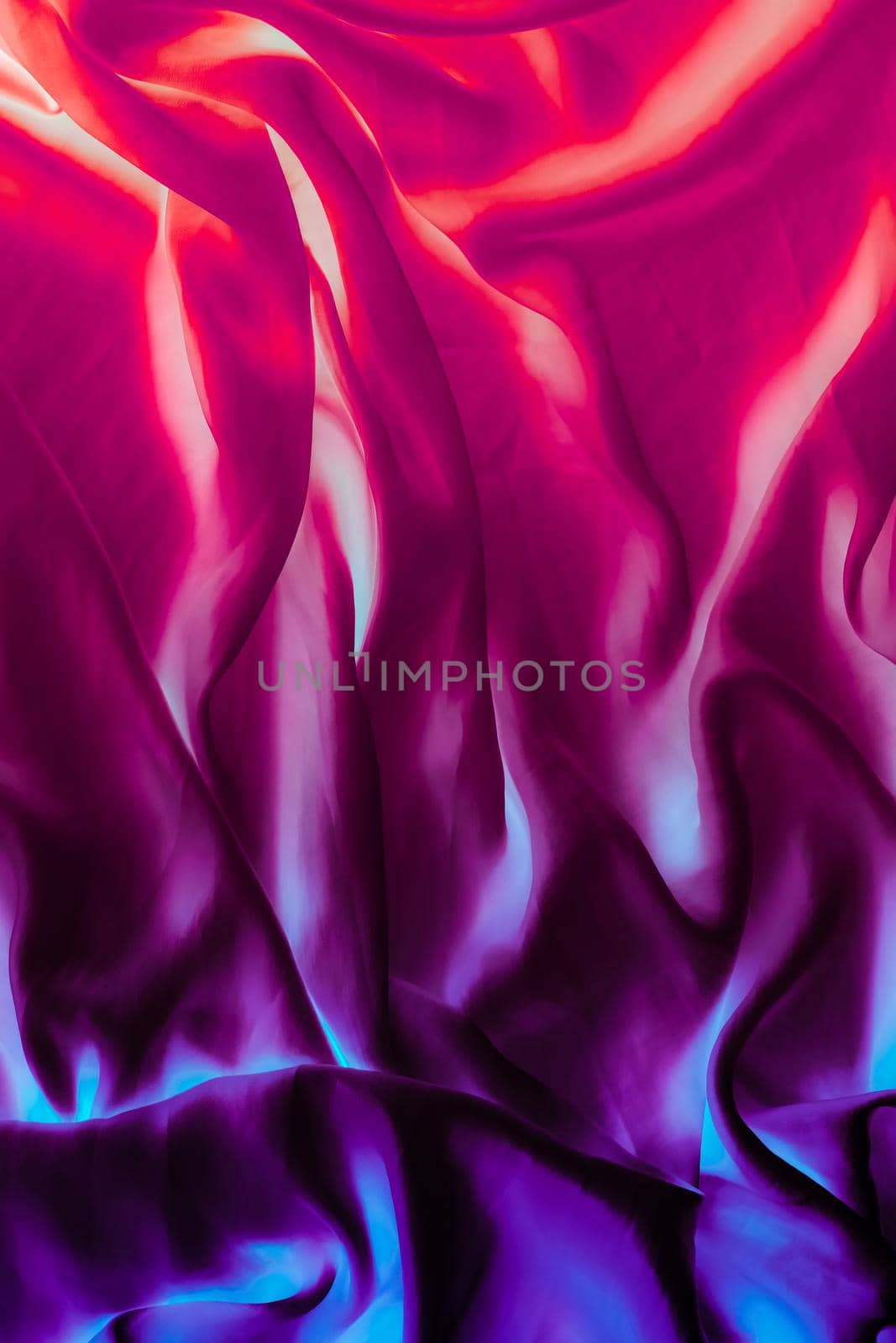 Fabric texture, abstract backdrop and modern luxury design concept - Colourful artistic silk waves, holiday background