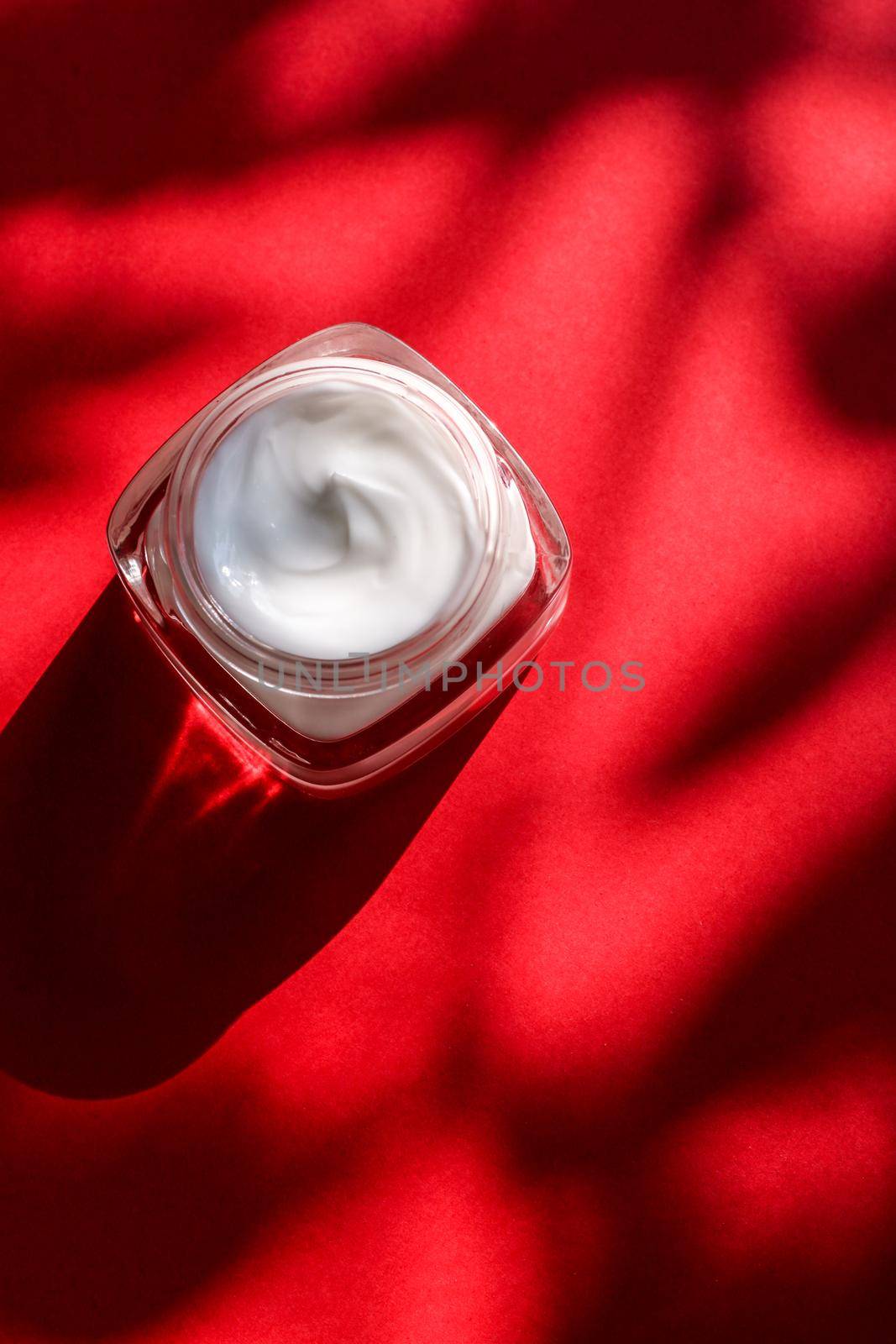 Moisturizing beauty face cream for sensitive skin, luxury spa cosmetic and natural clean skincare product on red background by Anneleven