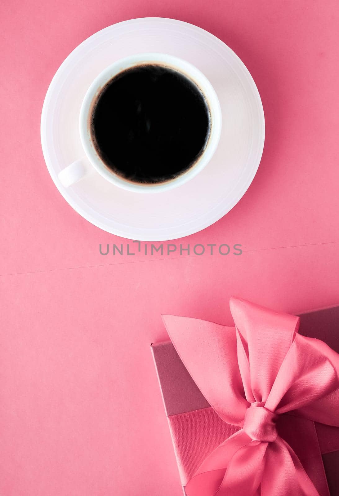 Luxury gift box and coffee cup on pink background, flatlay design for romantic holiday morning surprise by Anneleven