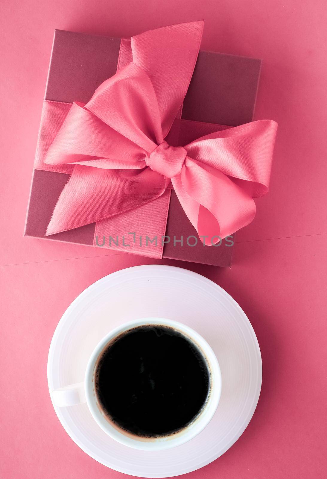 Luxury gift box and coffee cup on pink background, flatlay design for romantic holiday morning surprise by Anneleven