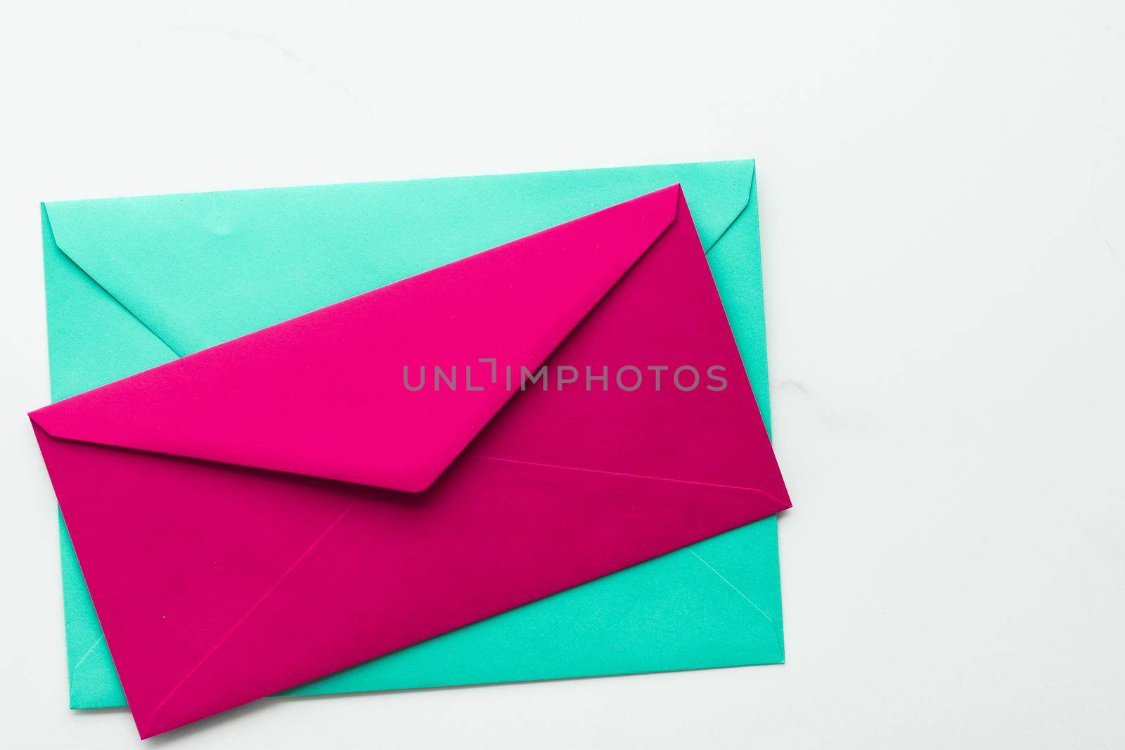 Blank paper envelopes on marble flatlay background, holiday mail letter or post card message design by Anneleven