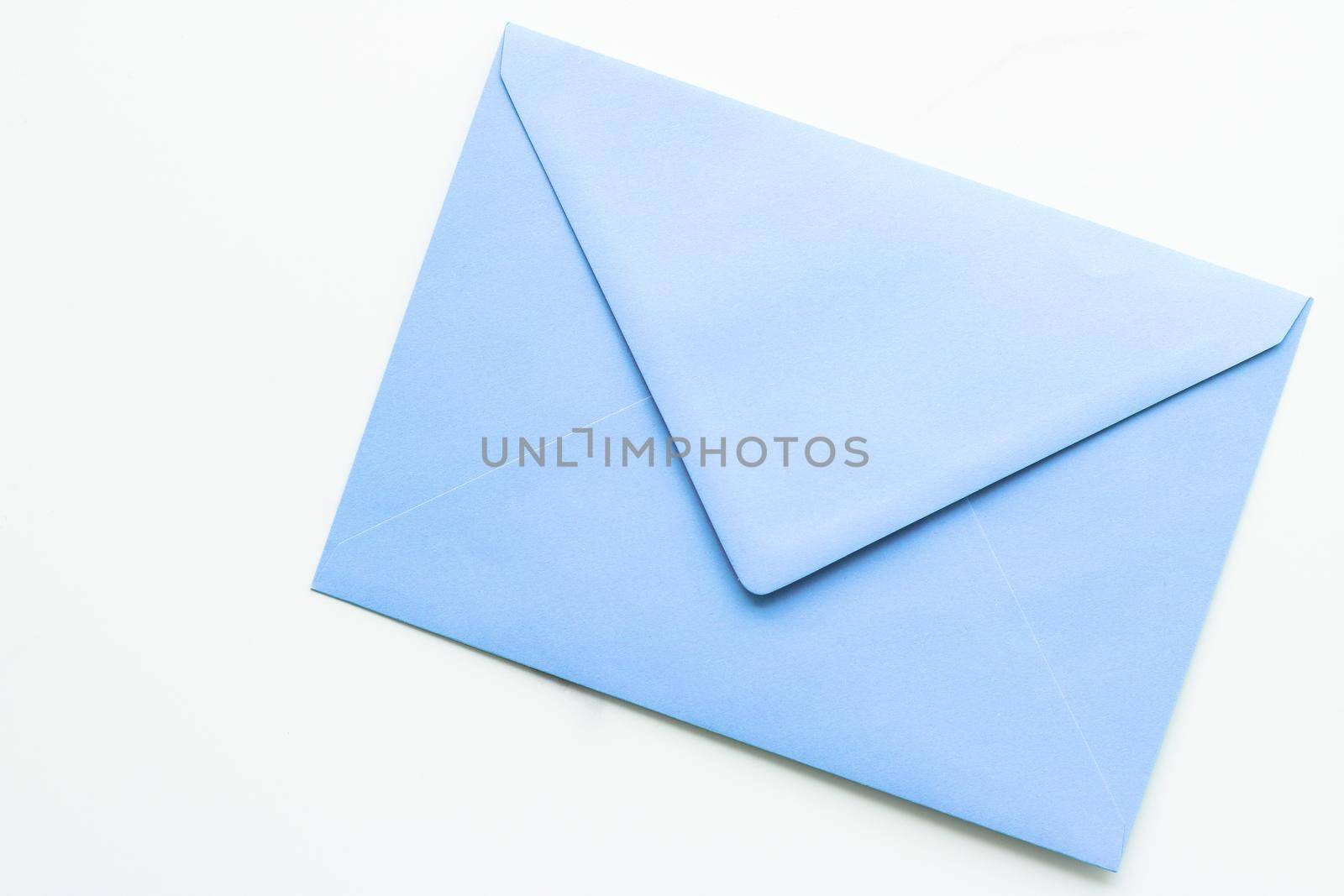 Blank paper envelopes on marble flatlay background, holiday mail letter or post card message design by Anneleven