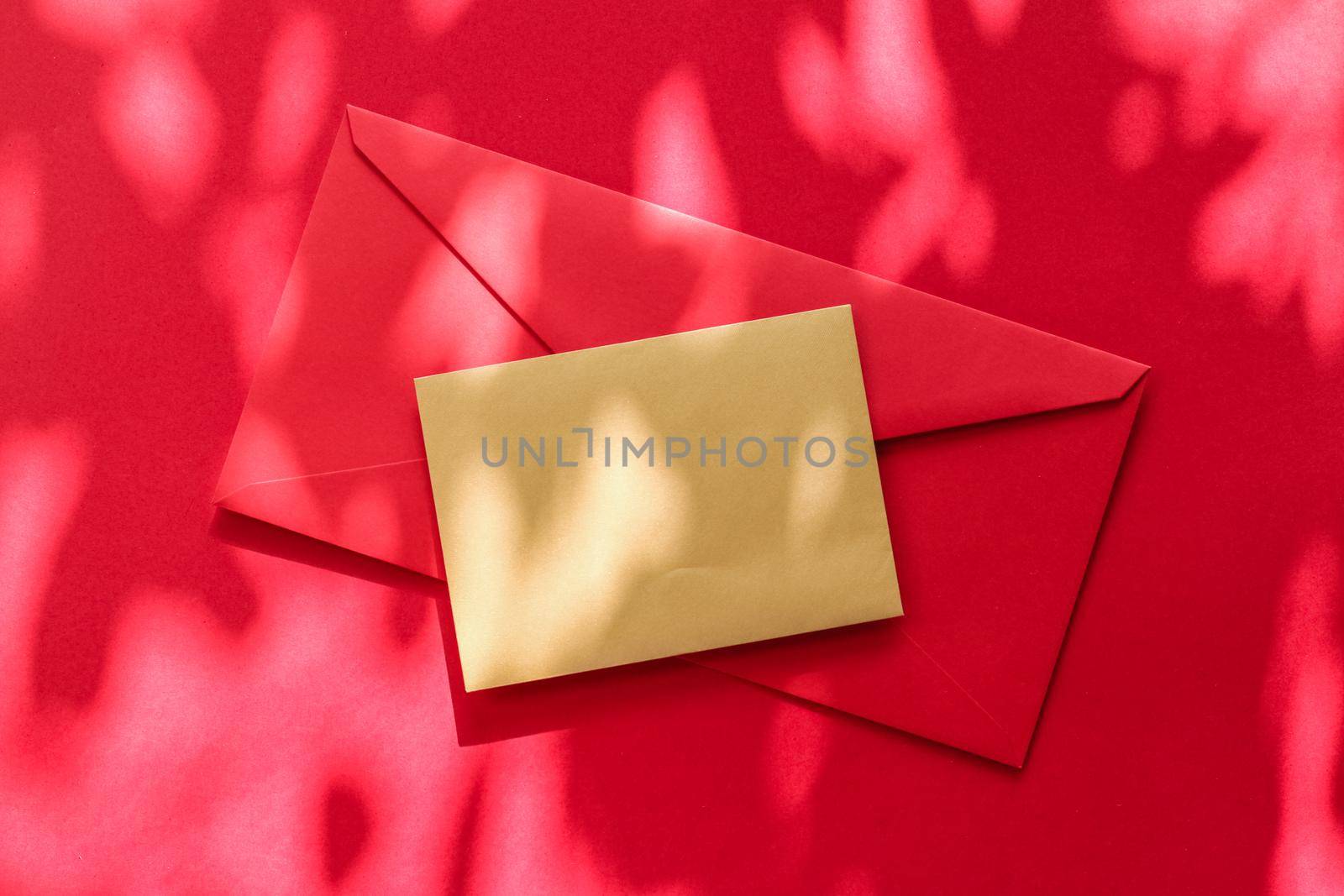 Holiday marketing, business kit and email newsletter concept - Beauty brand identity as flatlay mockup design, business card and letter for online luxury branding on red shadow background