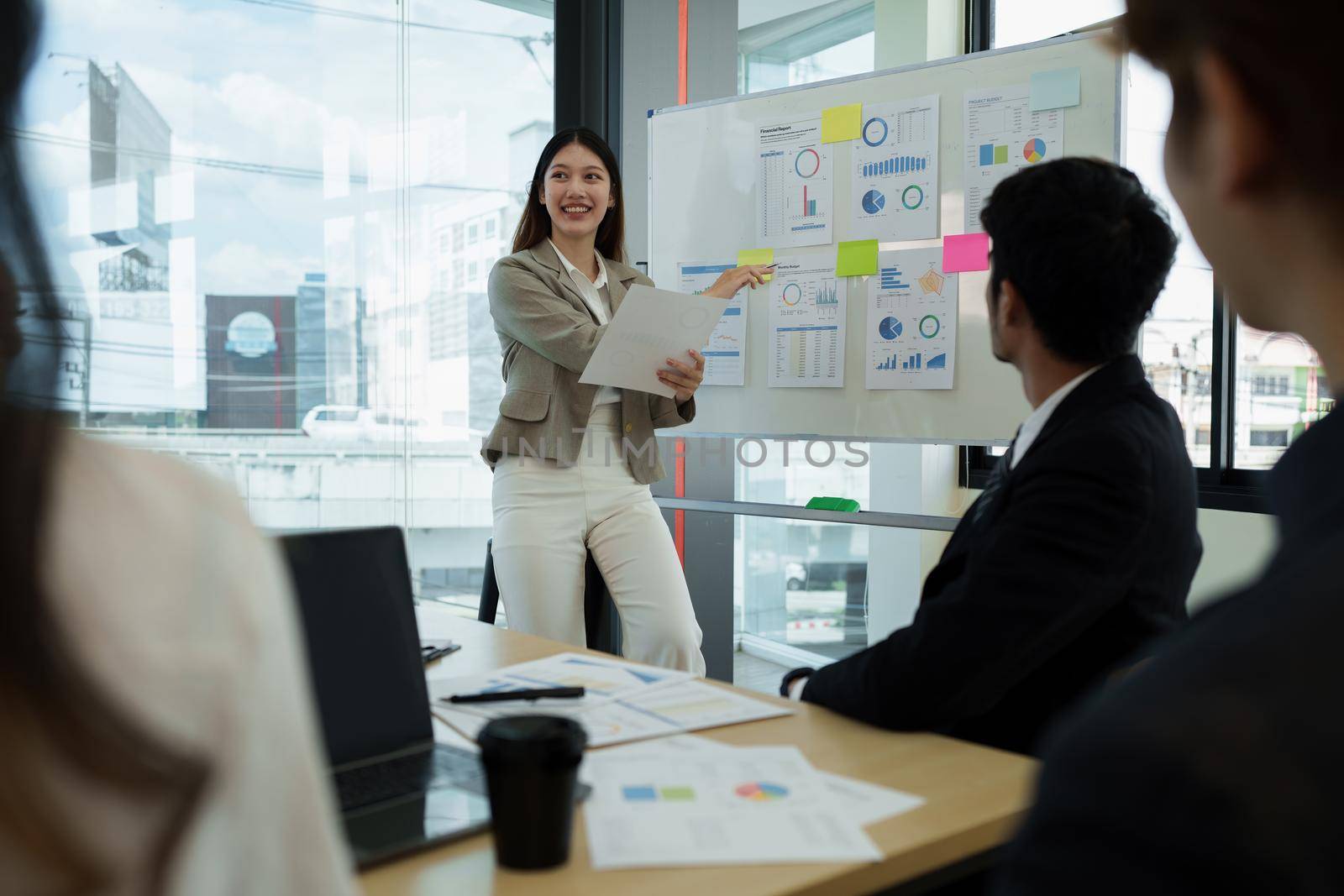 Financial Analyst discussing with Investment Banker at Meeting Room. Fund investment concept.