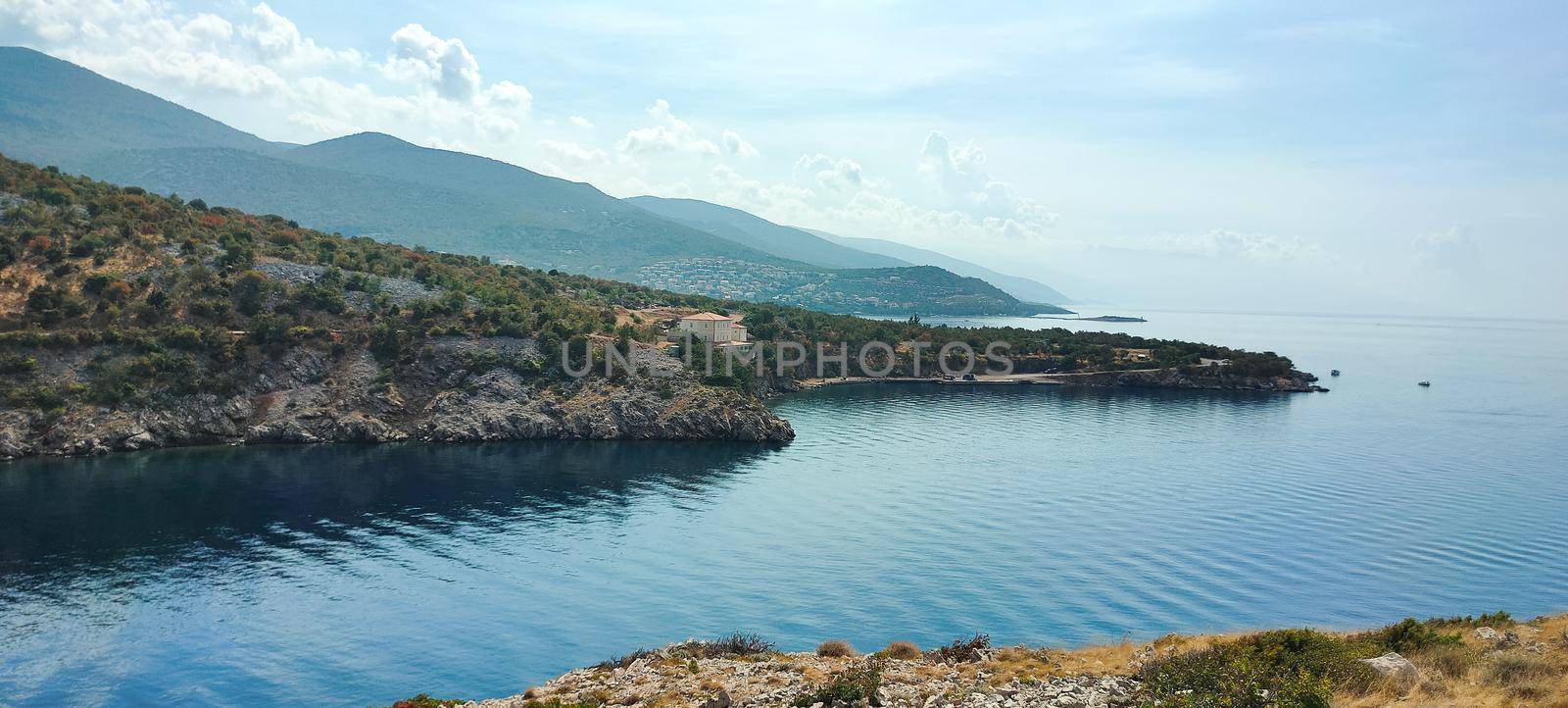 Beautiful seascape of sea, rocky beach in the valley by banate
