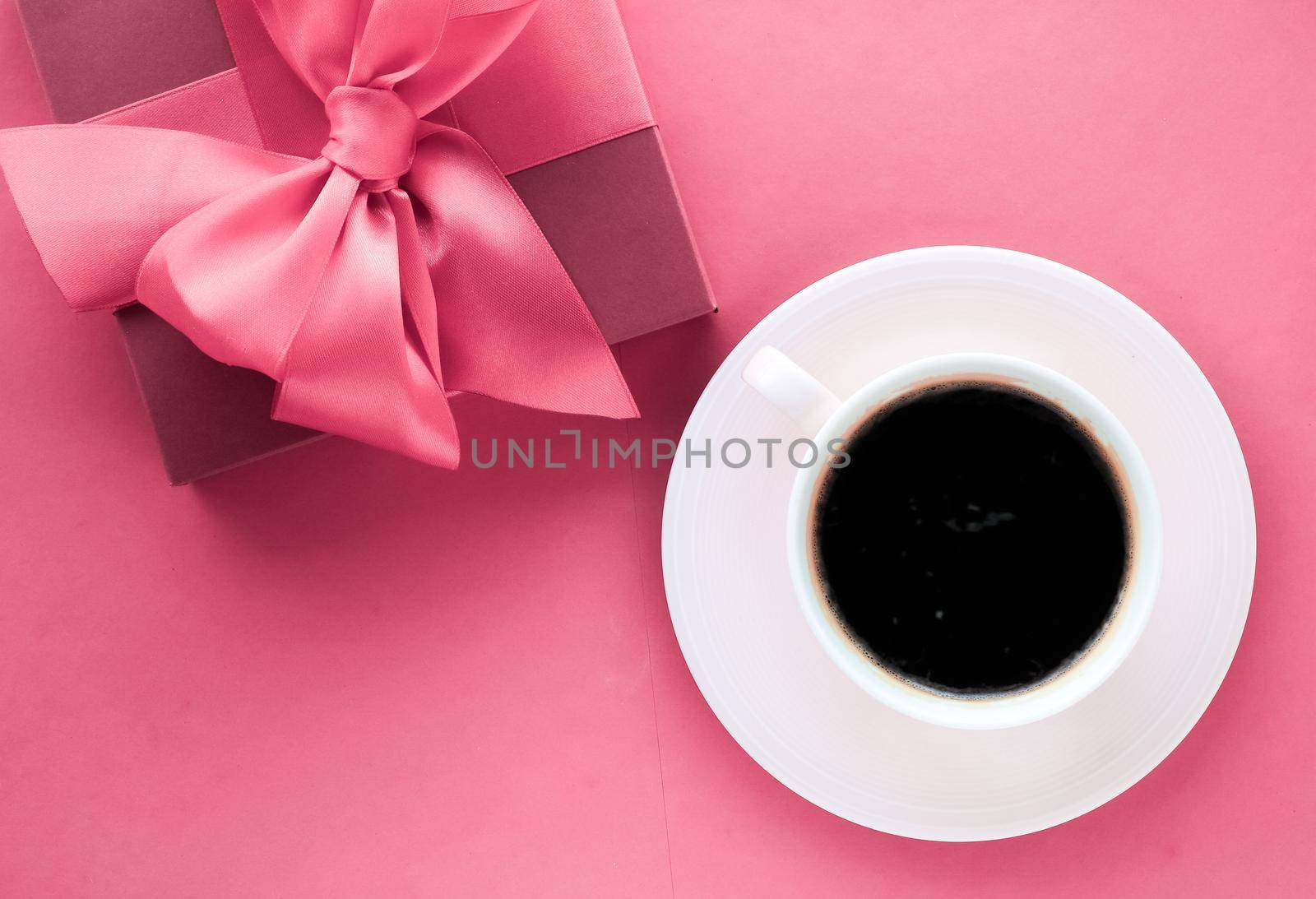 French chic, Valentines Day present and beauty drink concept - Luxury gift box and coffee cup on pink background, flatlay design for romantic holiday morning surprise
