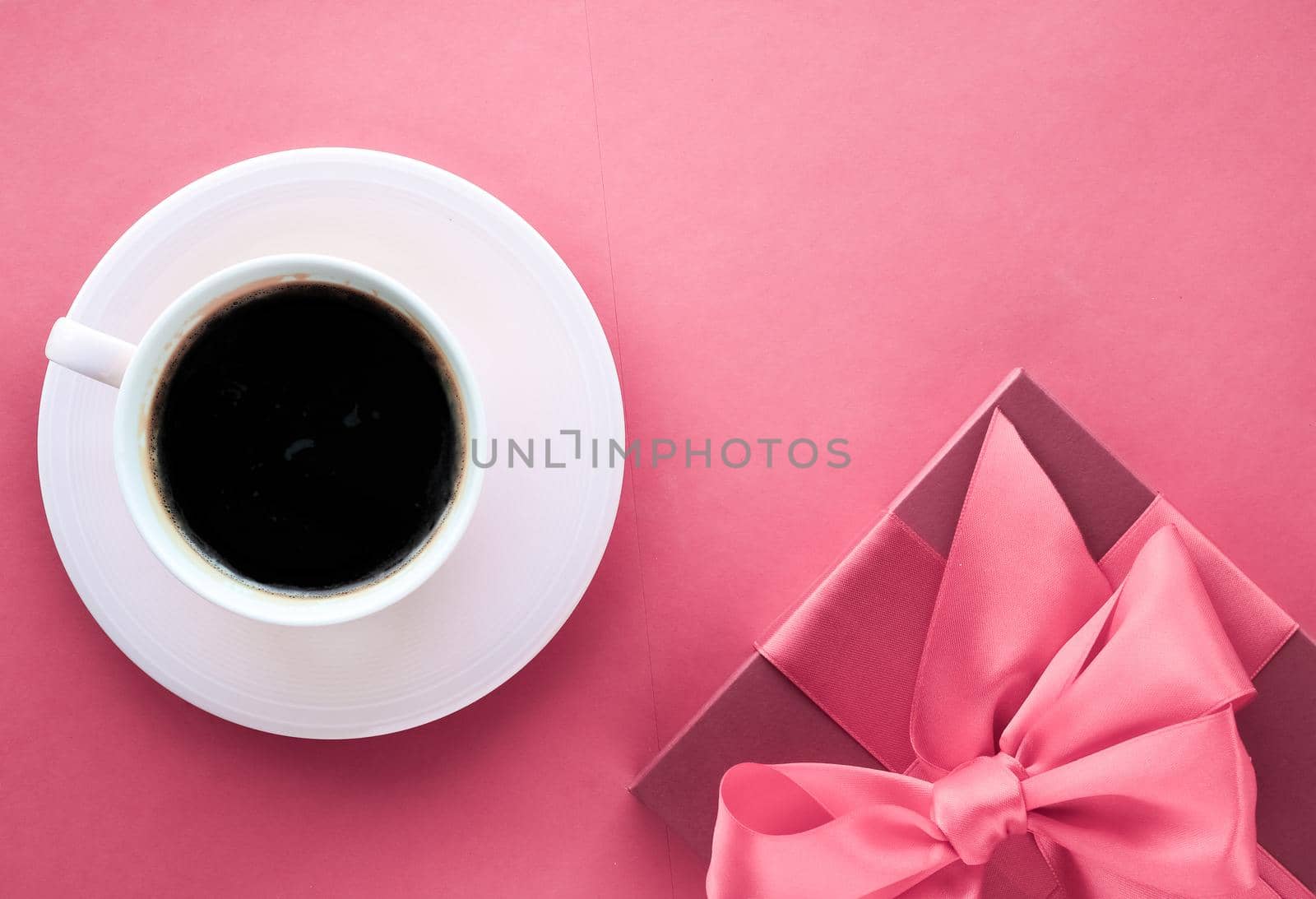 French chic, Valentines Day present and beauty drink concept - Luxury gift box and coffee cup on pink background, flatlay design for romantic holiday morning surprise